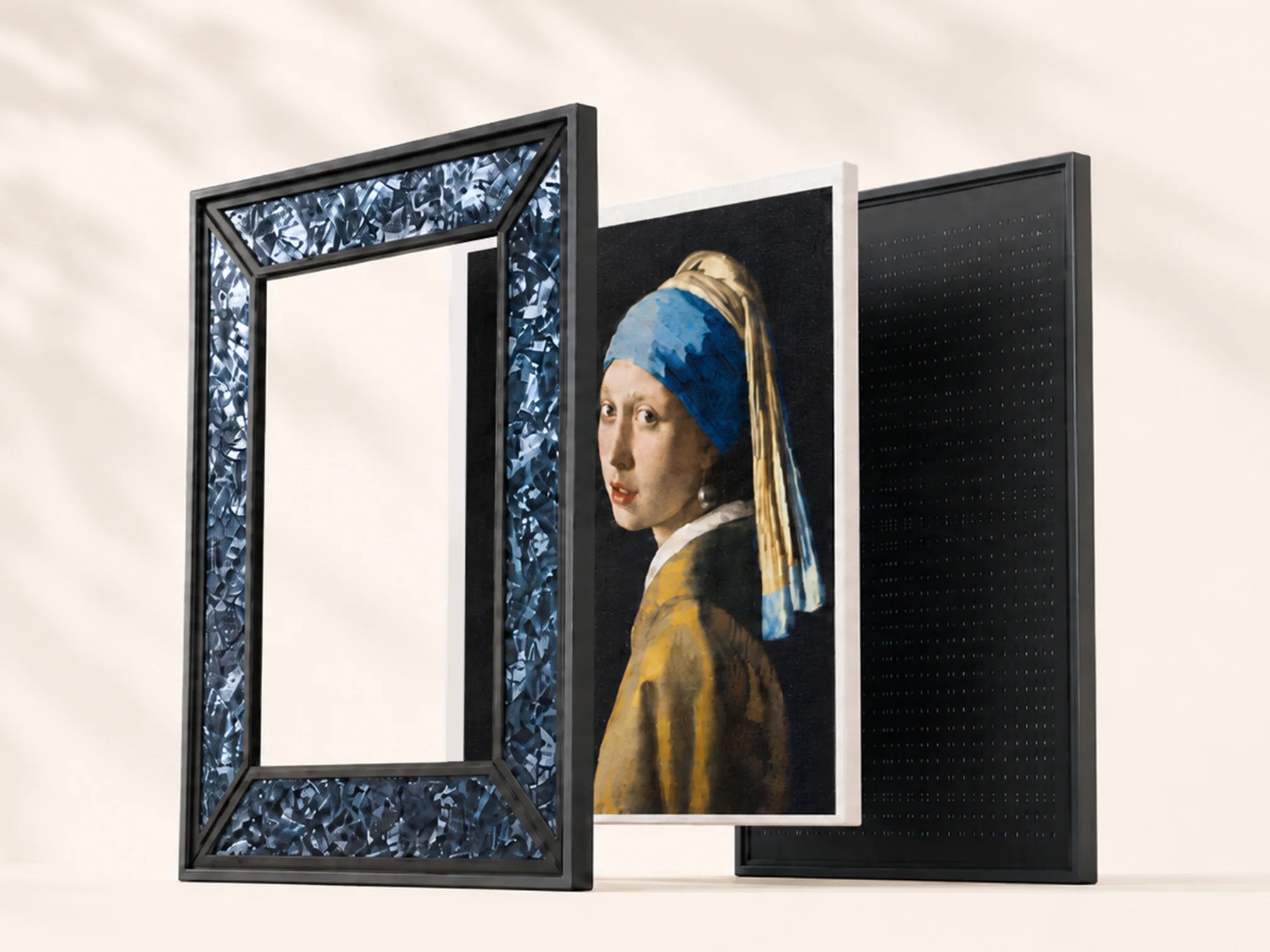 Exploded view of the outer frame, e-paper display, and magnetic perovskite panel